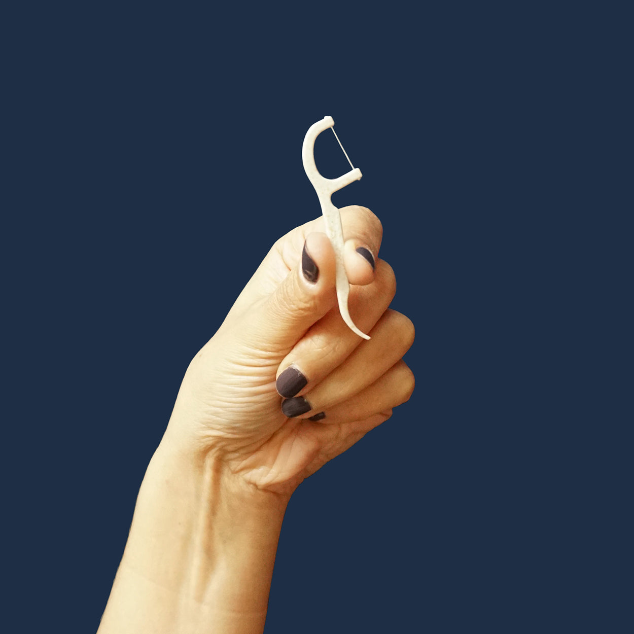 Better & Better Biodegradable Floss Picks in hand | hover